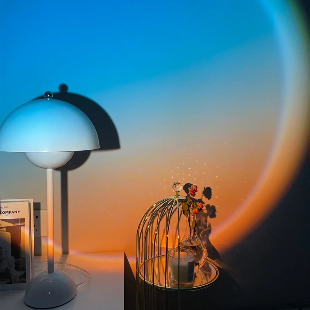 Sunset circle glowing behind a table lamp scene
