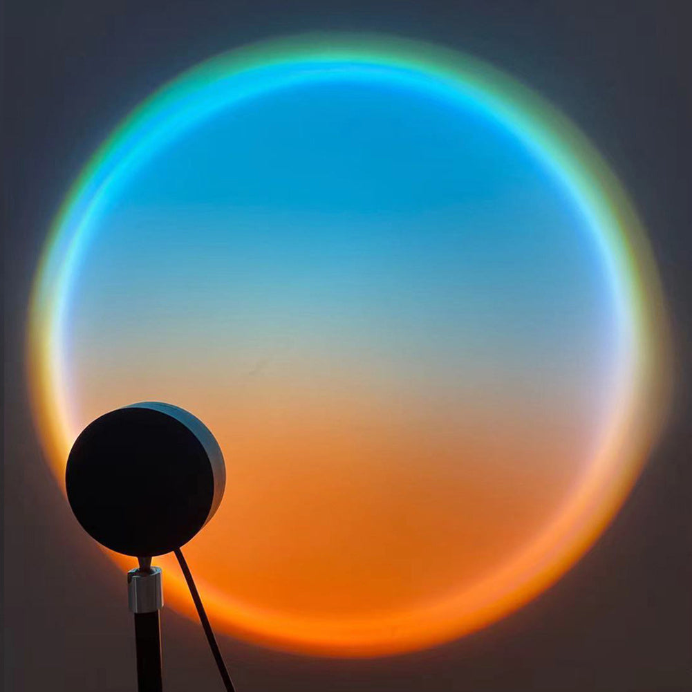 The sunset lamp casting its golden circle on a wall