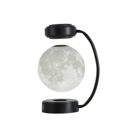 Levitating moon lamp, black frame, studio view