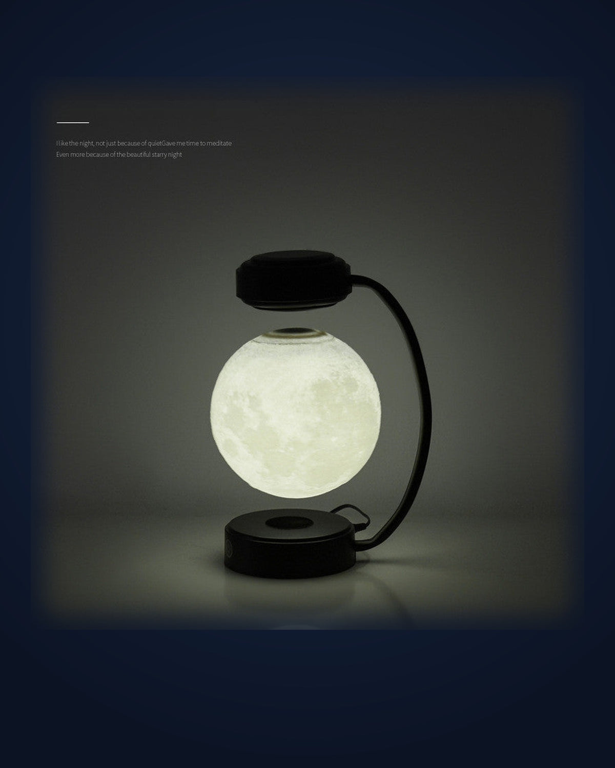 La Lune levitating moon lamp glowing on navy
