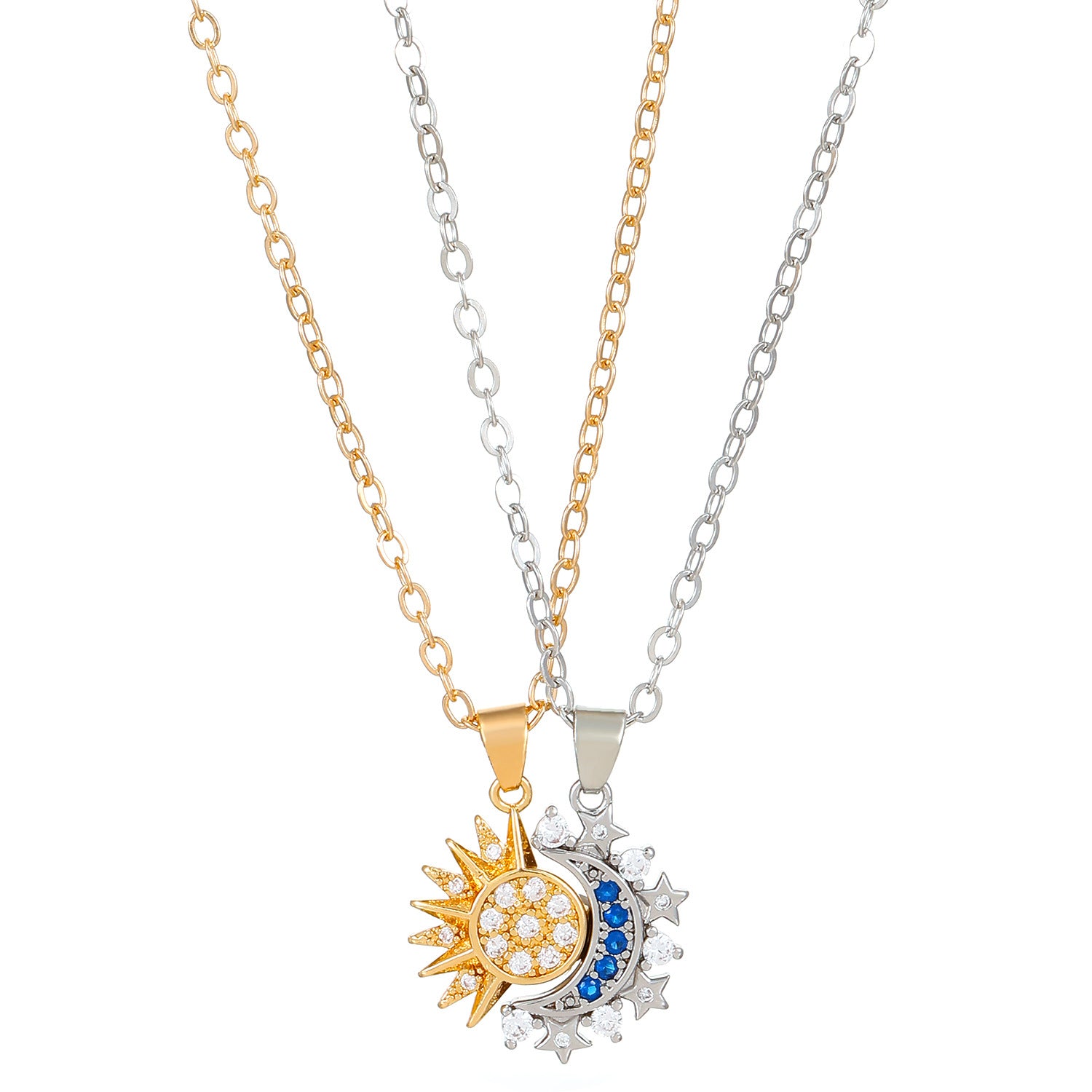 Gold and silver Éclipse pendants crossed