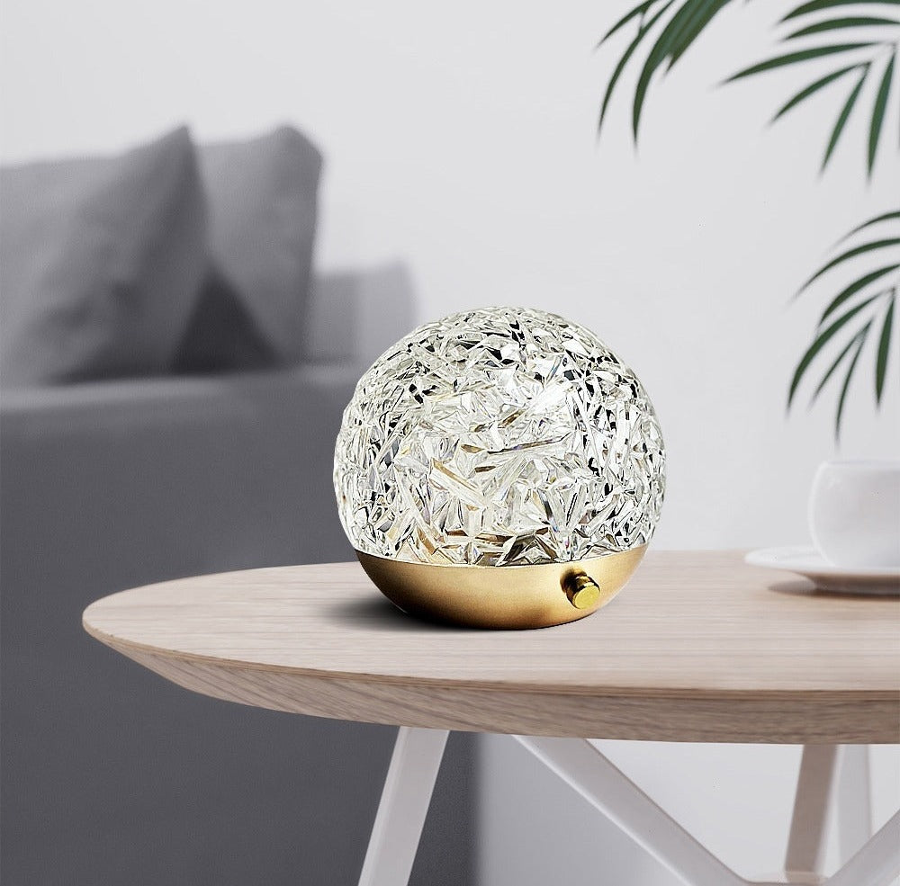 La Marée water ripple lamp on a wooden side table